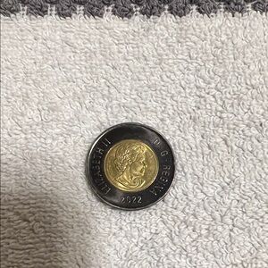 Black ring Toonie commemorating Queen Elizabeth II